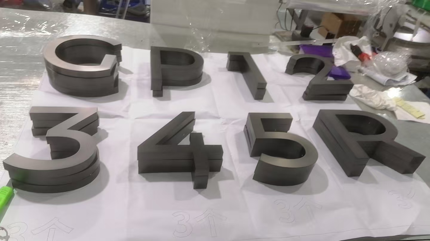 Custom metal signage letters in fabrication stage